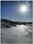 Eisige Dünen mit Strand